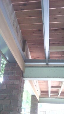 Under Deck roofing on brick pillars in progress